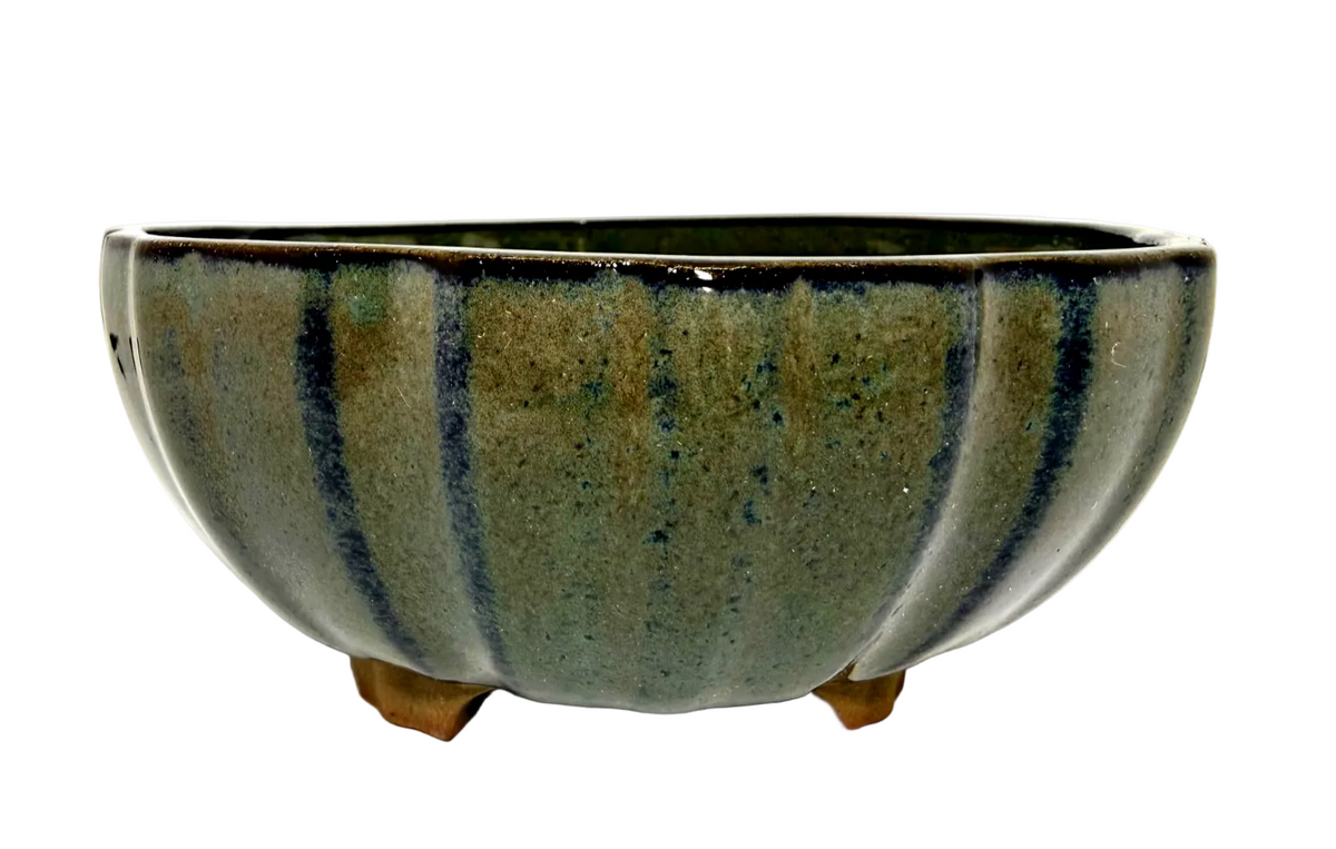 Round fluted bonsai pot with green-gray glaze, dark vertical streaks and short feet