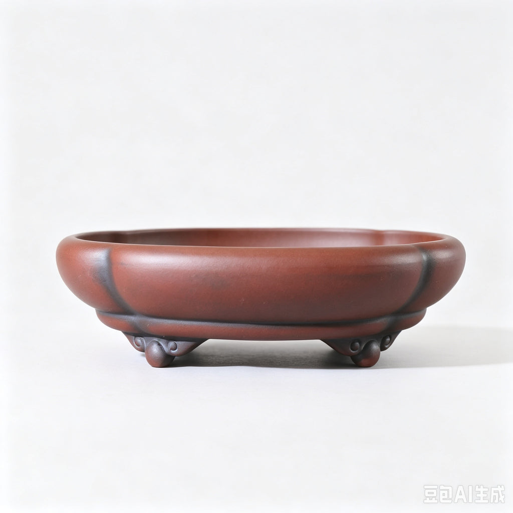 Red-brown lobed bonsai pot with curled feet against a white background