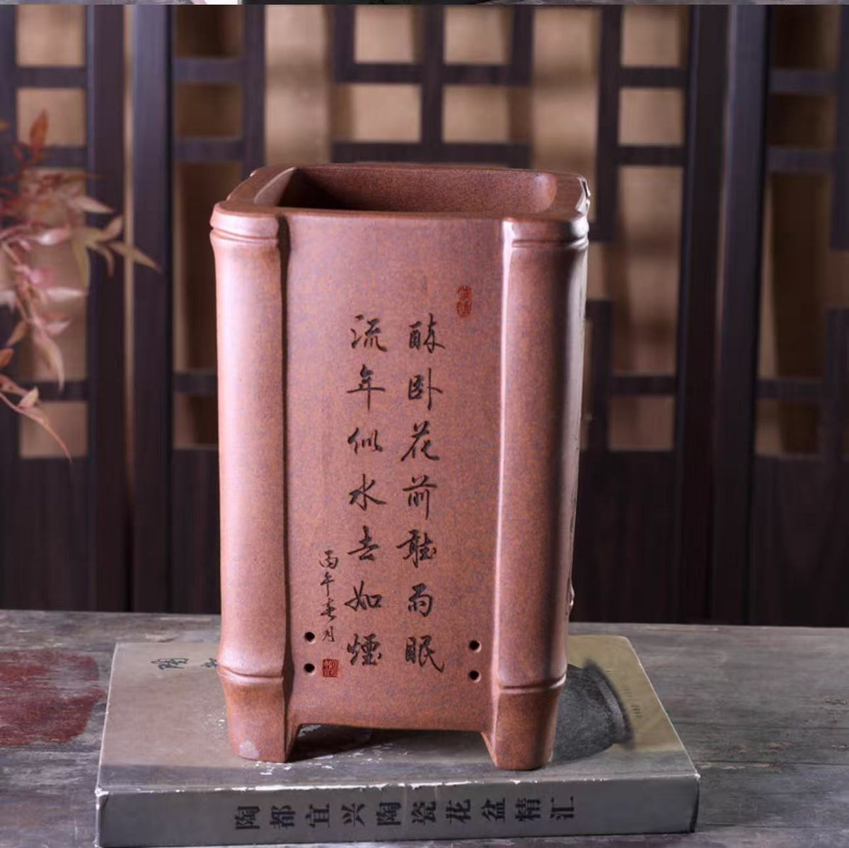 Tall reddish-brown square pot with bamboo-joint corners and calligraphy panel