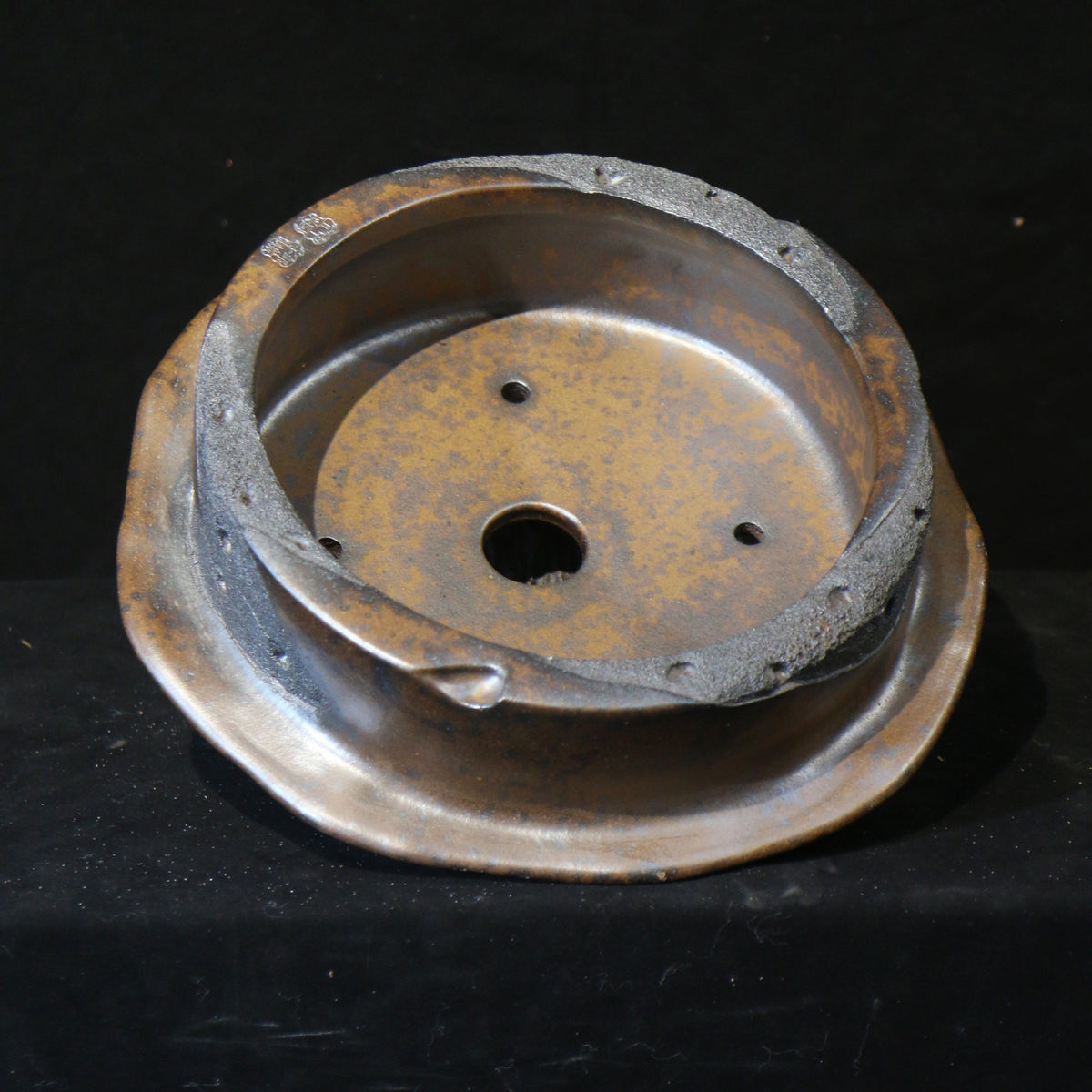 13" Round Yixing Zisha Clay Bonsai Pot - Bronze & Charcoal Glaze — inside view with drainage openings