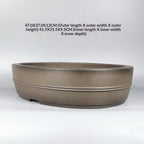 Angled taupe oval pot with size annotations