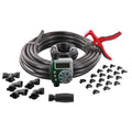 Orbit irrigation kit arranged on white with coiled tubing, digital timer, red cutting tool and black fittings