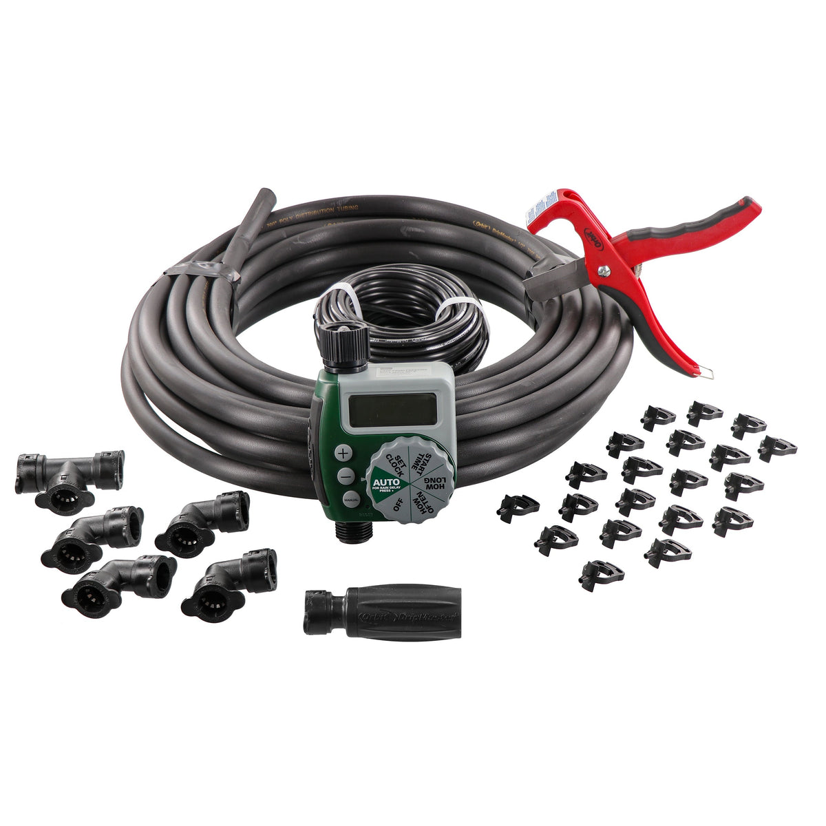 Orbit irrigation kit arranged on white with coiled tubing, digital timer, red cutting tool and black fittings