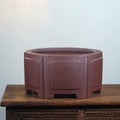 Brown paneled hexagonal Zisha bonsai pot on display stand; stand not included