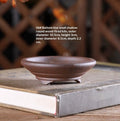 Small shallow brown round bonsai pot on low feet, with dimensions above