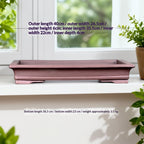 Brown rectangular bonsai pot with measurement labels on a windowsill