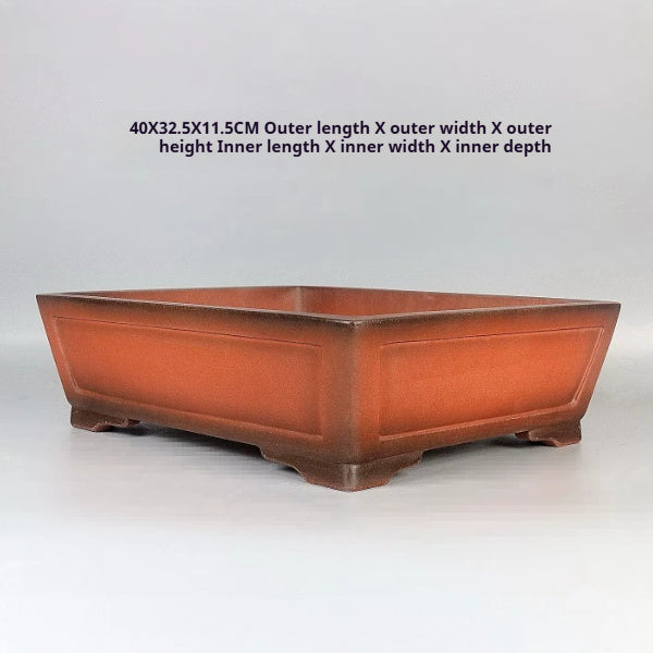 Orange-brown rectangular bonsai pot with measurement labels above