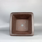 Square pot interior with drainage and wiring openings