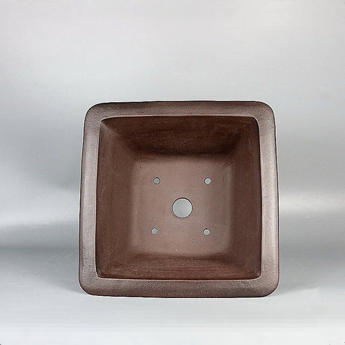 Square pot interior with drainage and wiring openings