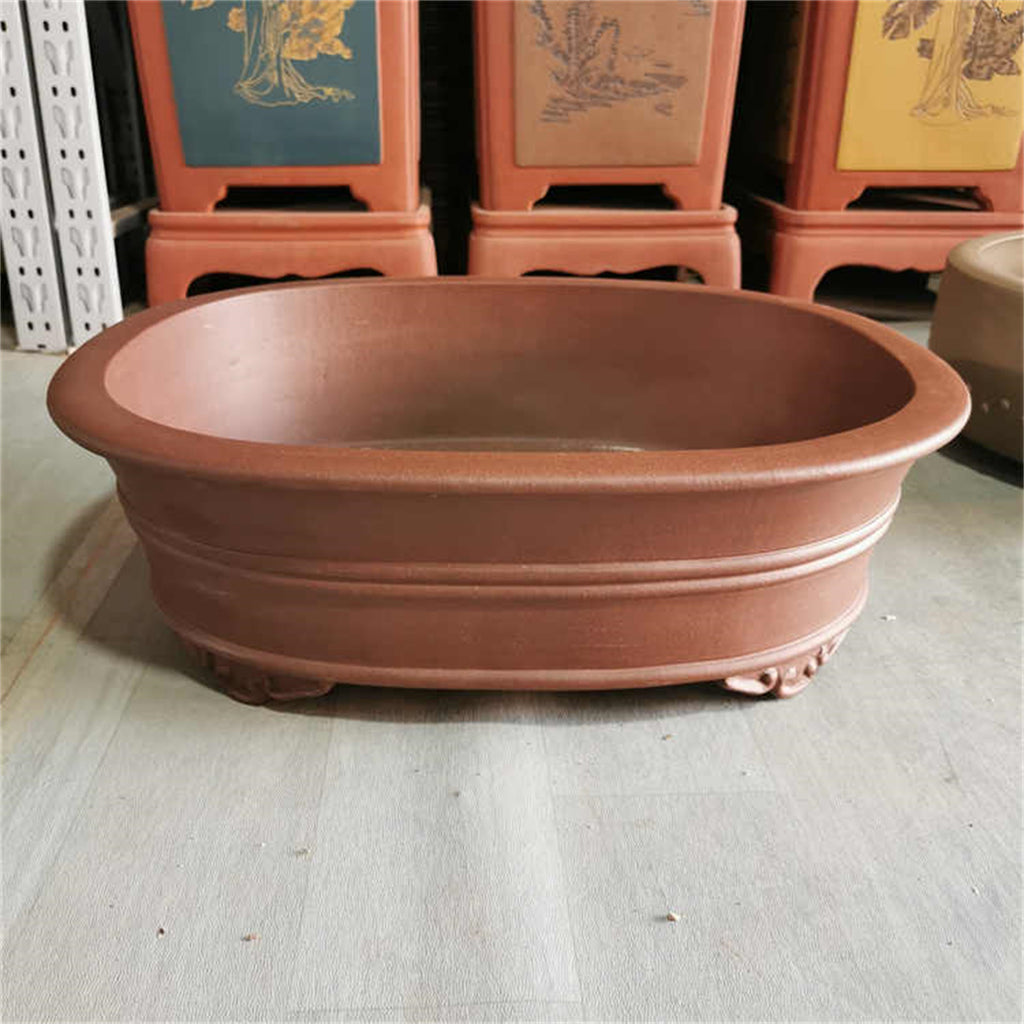 Brown oval bonsai pot with double horizontal bands and decorative feet
