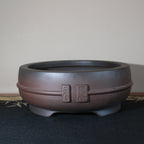 Dark-brown round bowl bonsai pot, side view