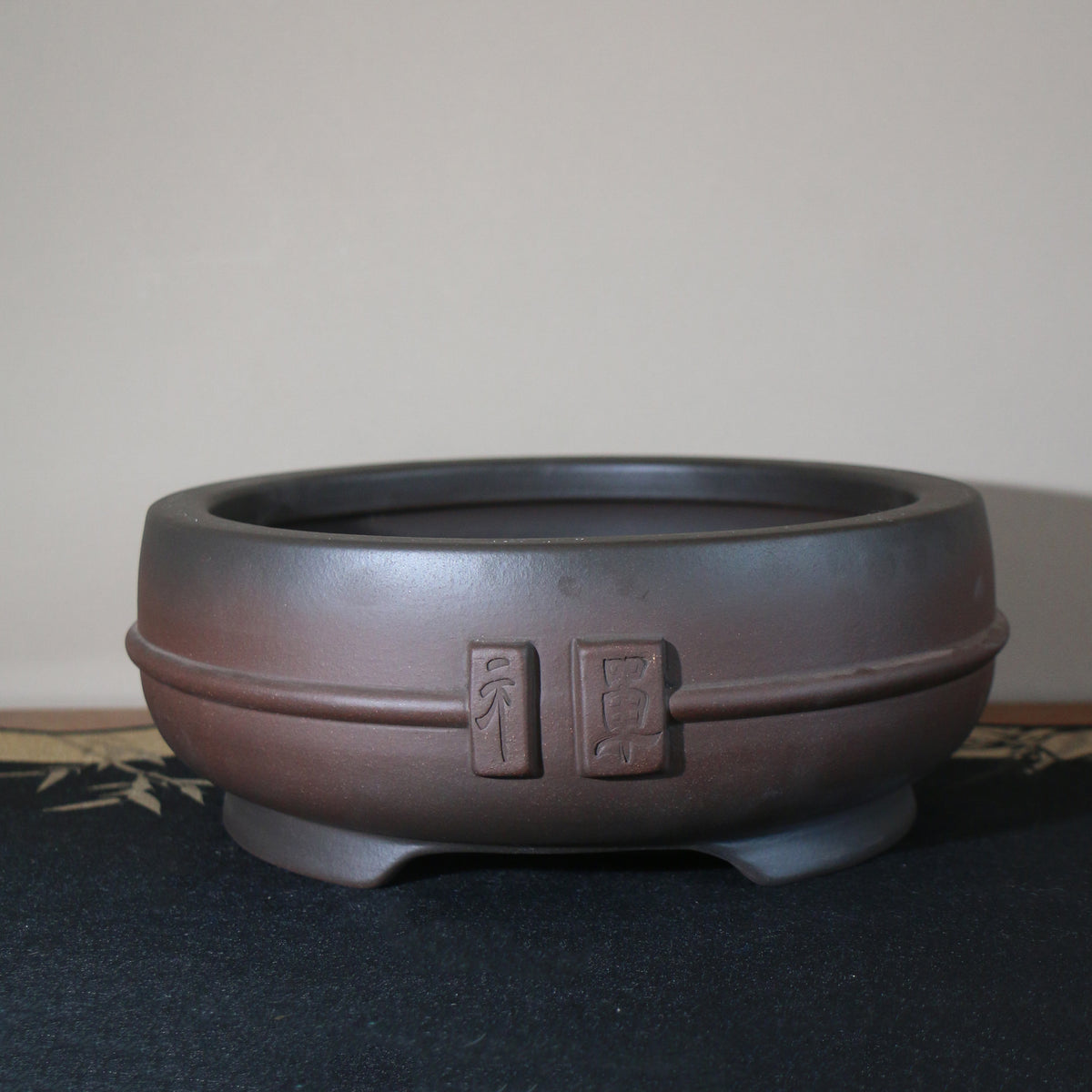 Dark-brown round bowl bonsai pot, side view