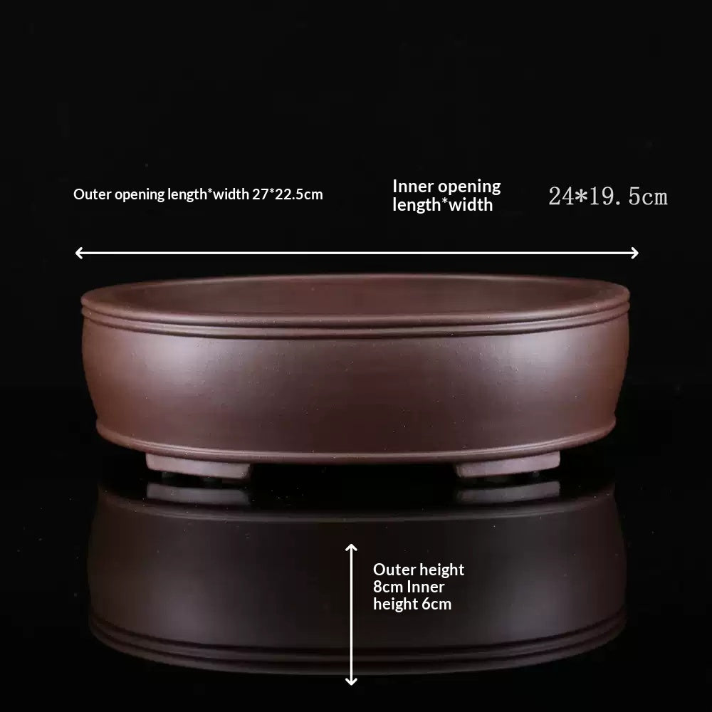 Brown oval bonsai pot with exterior and interior measurement arrows