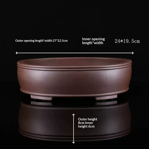 Brown oval bonsai pot with exterior and interior measurement arrows