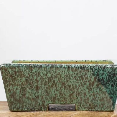 Green and brown mottled rectangular bonsai pot with notched base
