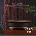 Oval purple-clay pot with exterior measurements