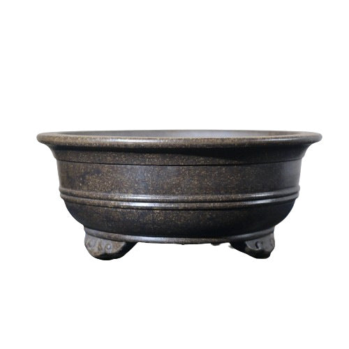 Isolated dark banded round pot with broad rim