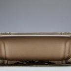Front detail of taupe rectangular pot showing rim and feet