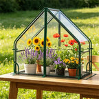 Compact mini greenhouse on a garden bench