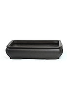 Isolated front view of the dark rounded-rectangle bonsai pot