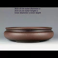 Front view of the brown round pot with size annotations