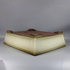 Ivory rectangular pot upside down showing glazed walls and feet