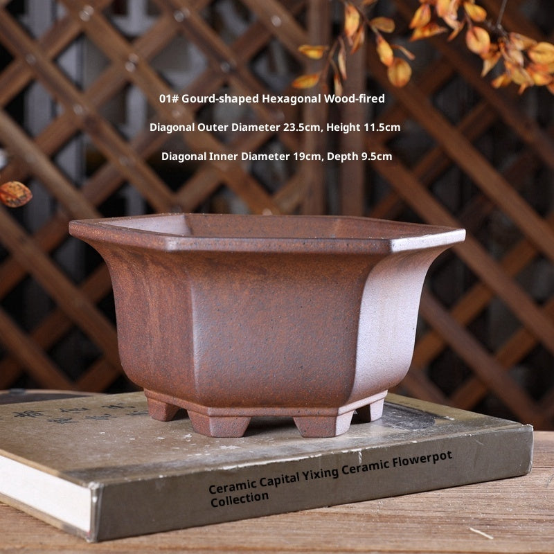Brown hexagonal bonsai pot with diameter, height and depth labels