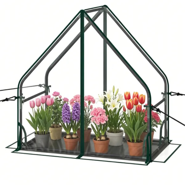 Front opening of compact clear PVC mini greenhouse