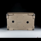 Underside of taupe rectangular pot showing two large openings and corner feet