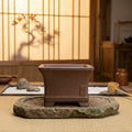 Brown square bonsai pot with flared rim and small raised side seal