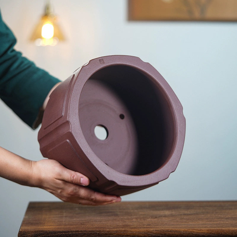 Hexagonal Zisha pot interior with drainage opening