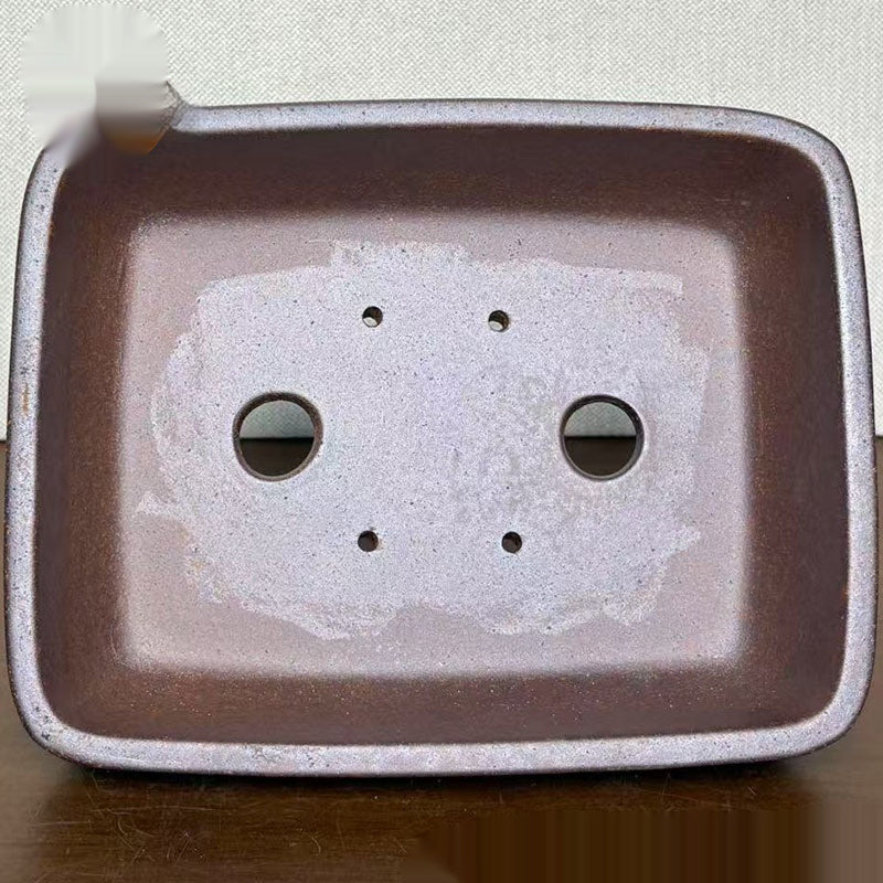 Interior drainage and wiring openings of rectangular stoneware pot