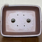 Interior drainage and wiring openings of rectangular stoneware pot