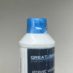Close-up of the filter's blue protective cap and white neck