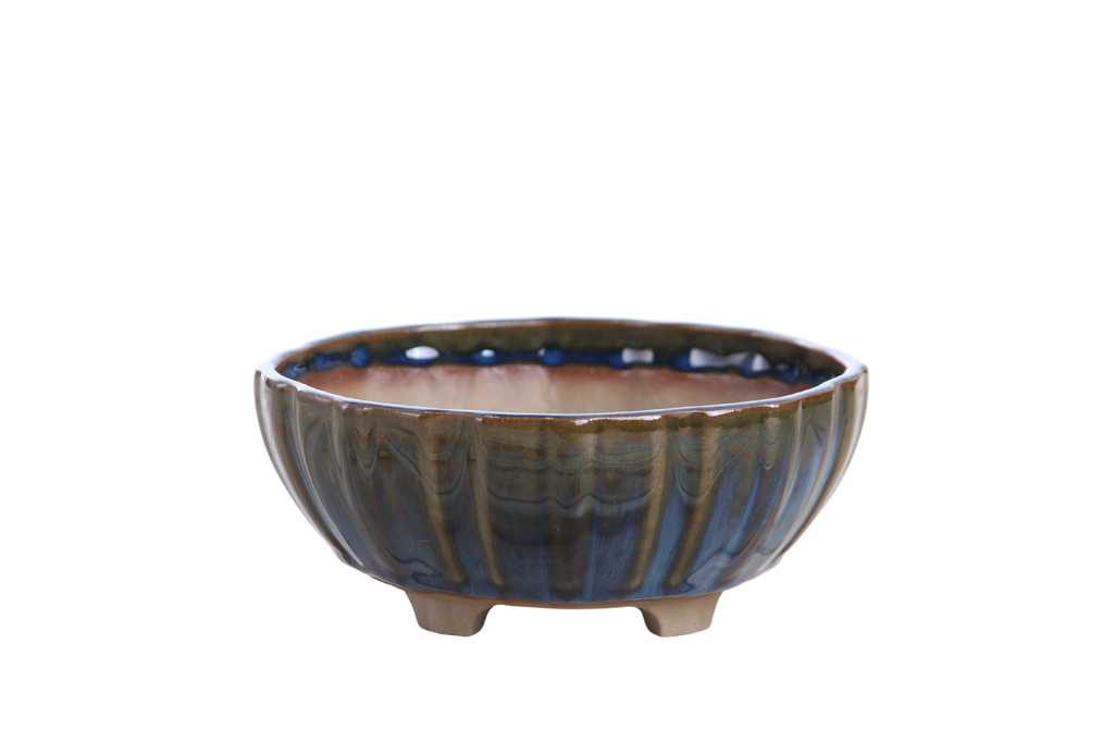 Blue-green round fluted bonsai pot with dark vertical glaze streaks and short feet