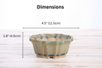 Dimension graphic of the muted moss-green flower-shaped bonsai pot labeled 4.5-inch width and 1.8-inch height