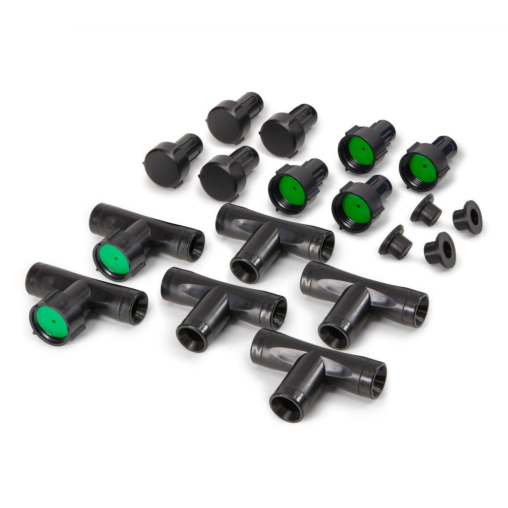 Assorted black hose fittings, tees, plugs and connectors with green inserts