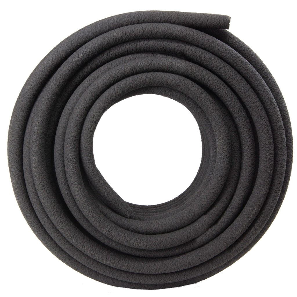Overhead view of a loose coil of black soaker hose