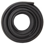 Overhead view of a loose coil of black soaker hose