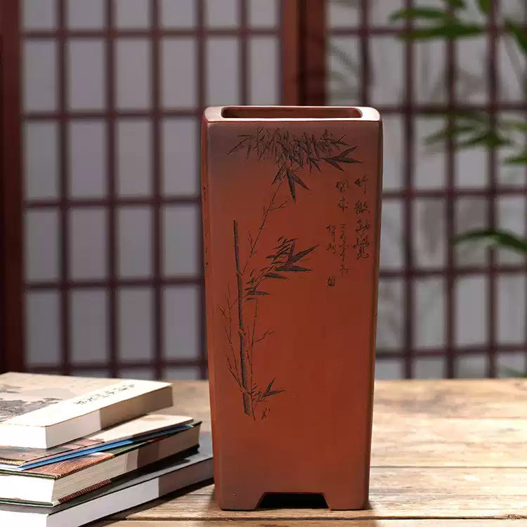Tall reddish-brown square pot with bamboo decoration