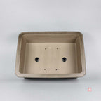 Top view of taupe rectangular pot showing two large openings and four small holes