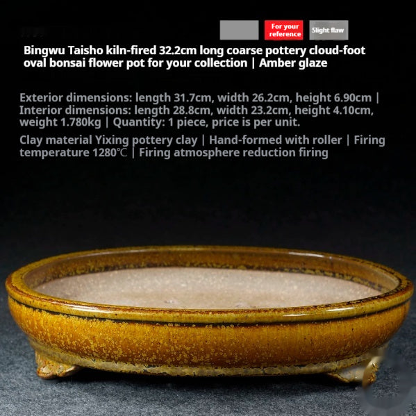 Amber-glazed oval bonsai pot with a double rim and short decorative feet, with dimensions above
