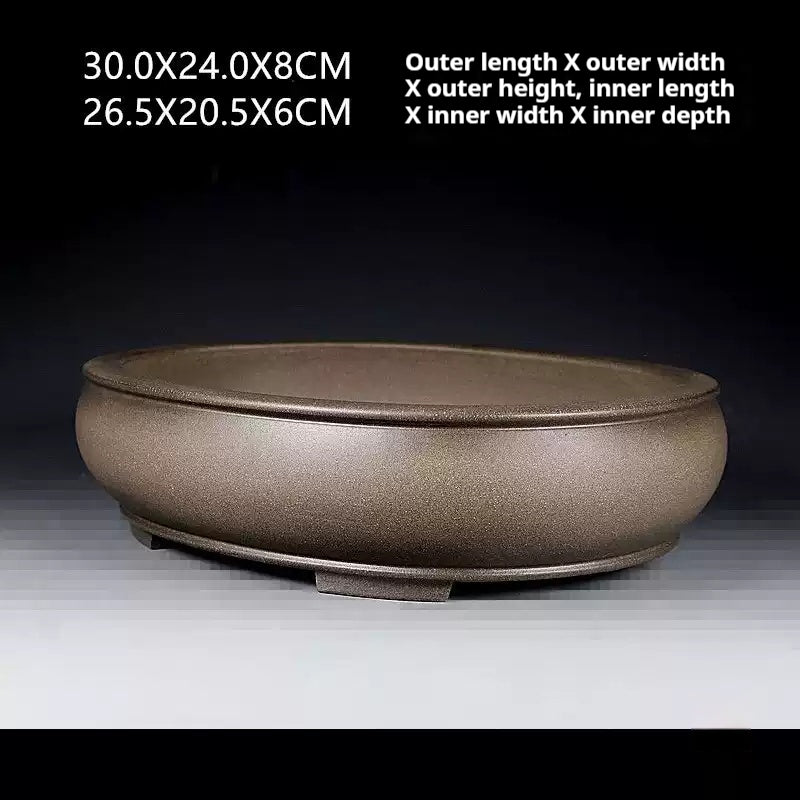 Side view of the taupe oval pot with measurement labels