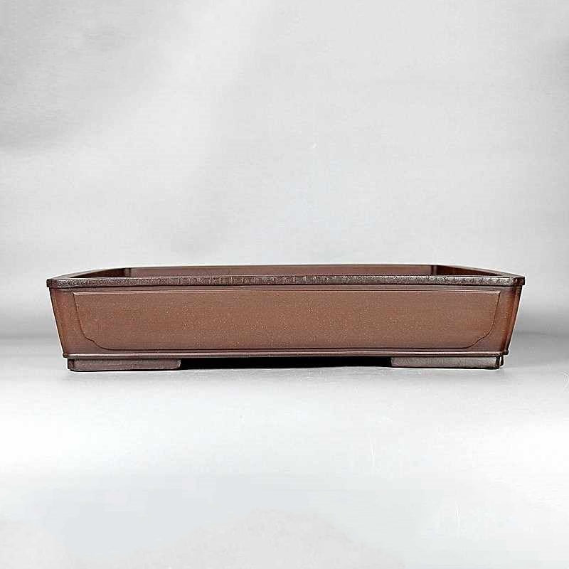 Brown rectangular bonsai pot with inset side panels and dark corner accents