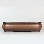 Front view of the brown rounded-wall rectangular pot
