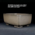 Angled gray-brown rectangular pot with measurement labels