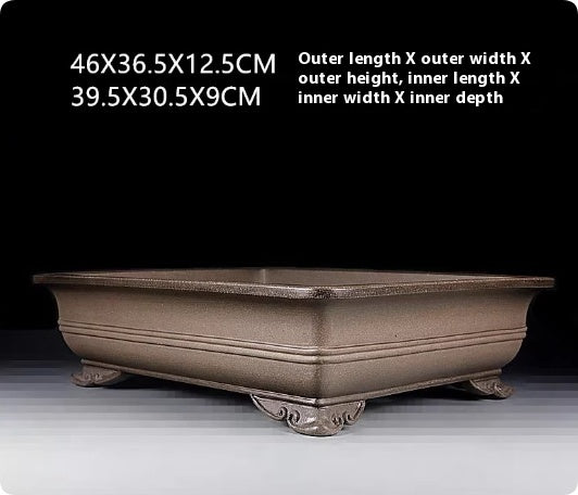 Cloud feet and rounded corner detail of taupe rectangular pot