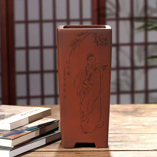 Tall reddish-brown square pot with engraved figure and branch decoration