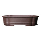 Layered side walls of purple clay bonsai pot