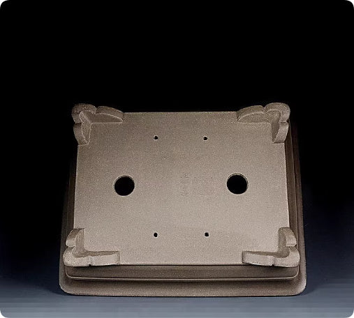 Taupe rectangular pot underside showing drainage holes
